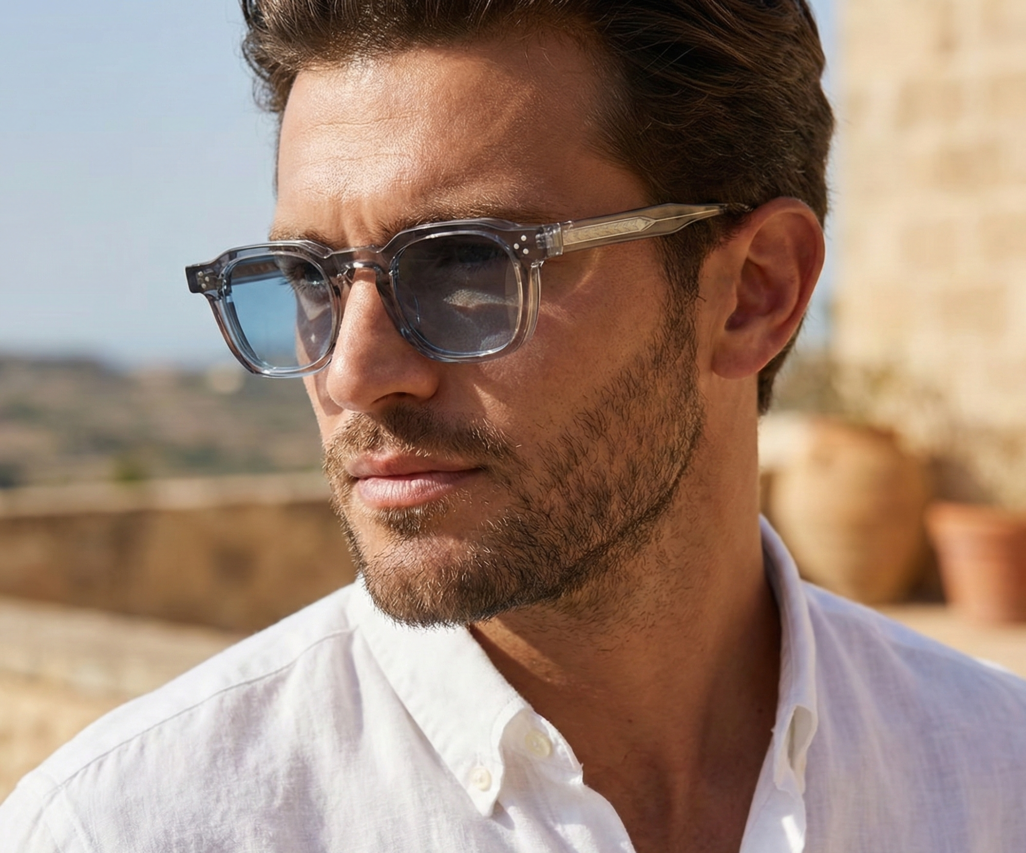 Le Rétro sunglasses on man in white shirt